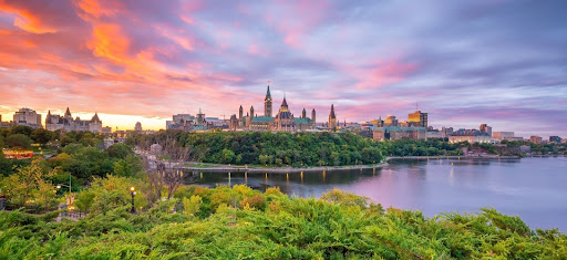 Image: Ottawa skyline from the river at dusk