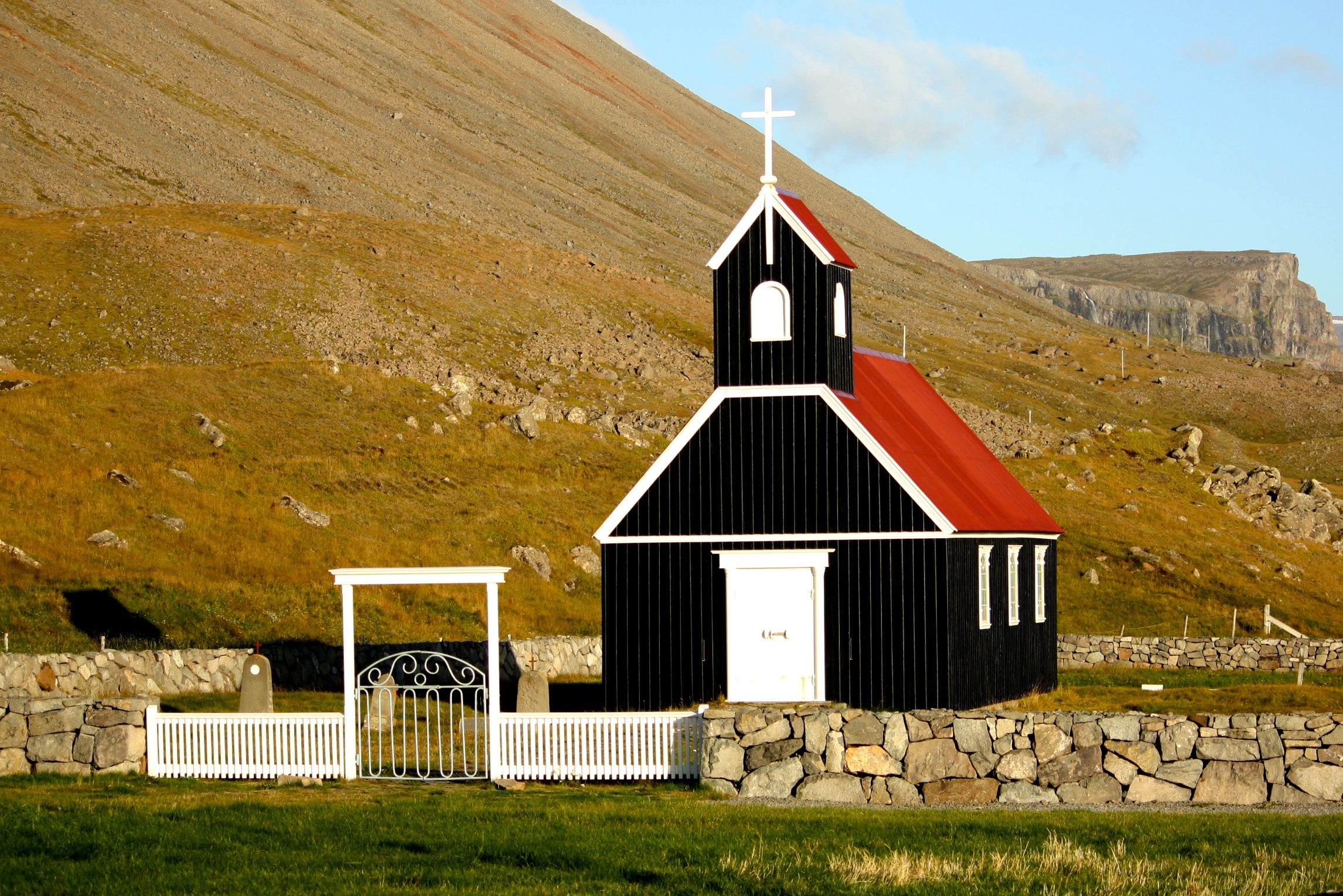 Small church by a hill