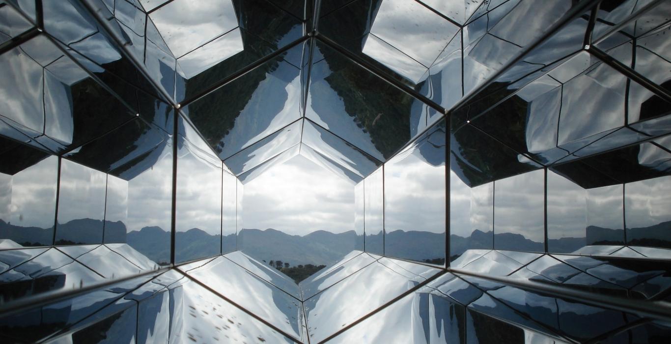 Banner photo - buildings mirroring each other