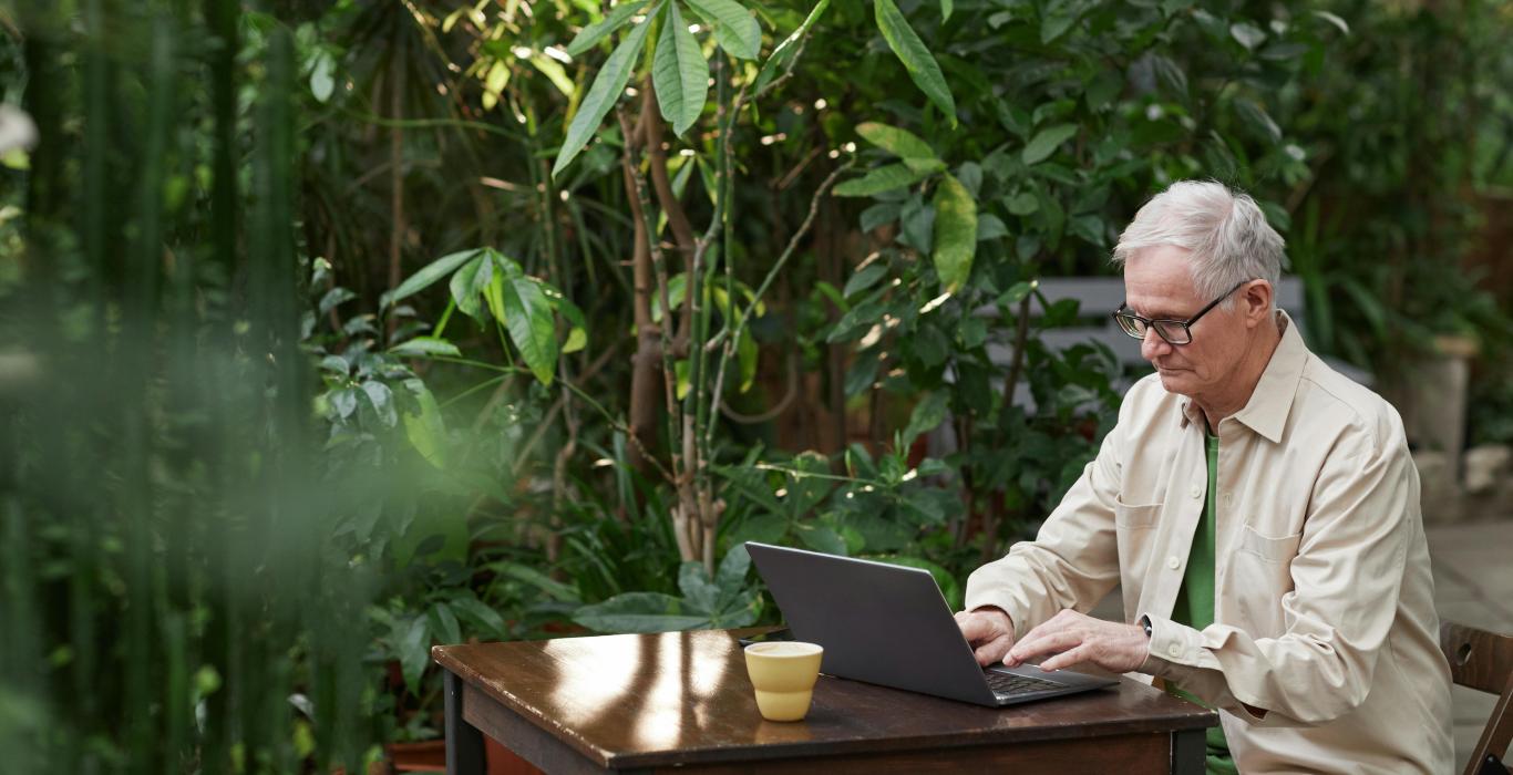 Man Busy Using His Laptop