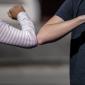 two people elbow bumping
