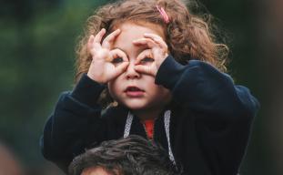 girl using pretend goggles